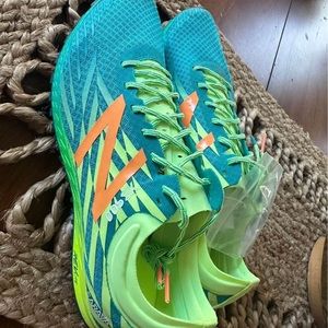 Women’s brand new new balance spikes size 9